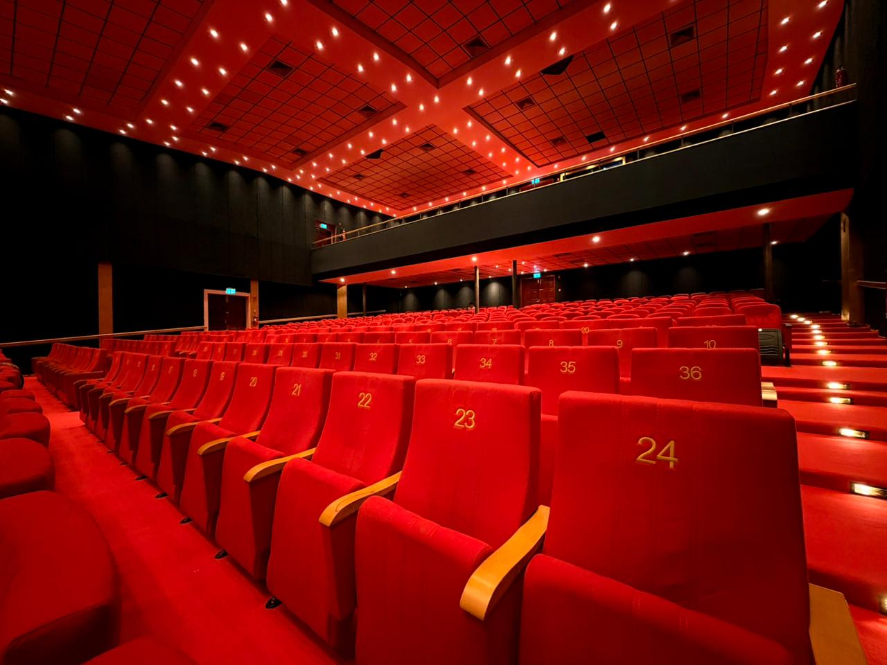 Dubai Folklore Theatre — numbered red velvet seating
