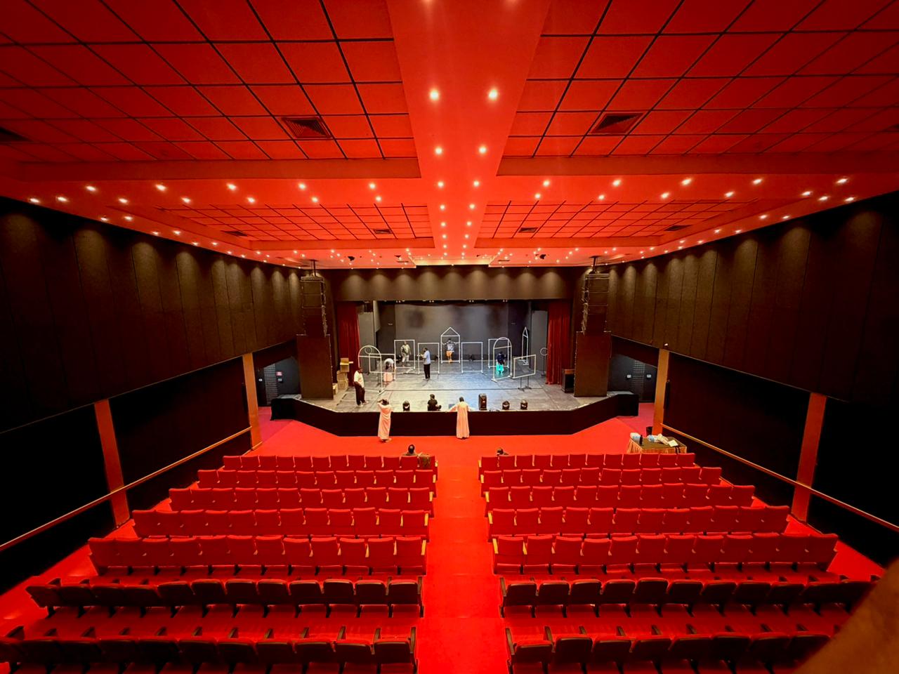 Dubai Folklore Theatre — wide auditorium with rehearsal on stage